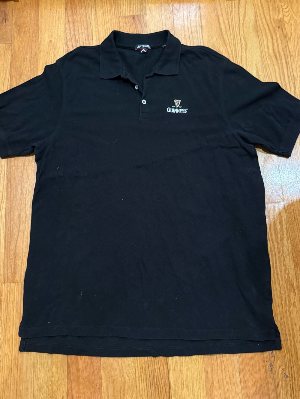 Antigua Men's Black Guinness Embroidered Logo Golf Polo Shirt